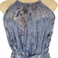Blue floral dress on a mannequin with a white background
