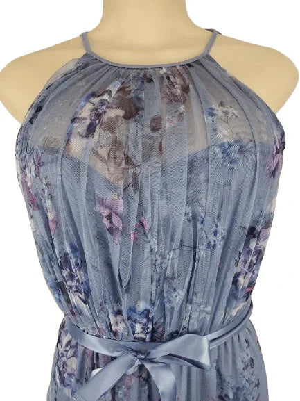 Blue floral dress on a mannequin with a white background