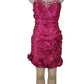 Pink strapless dress with floral details on a mannequin against a white background