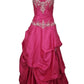 Pink strapless gown with silver embroidery on a white background