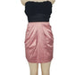 Mannequin wearing a black and pink dress on a white background