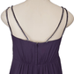 Purple dress with thin straps on a mannequin against a white background