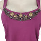 Purple tank top with embellished neckline on a mannequin against a white background