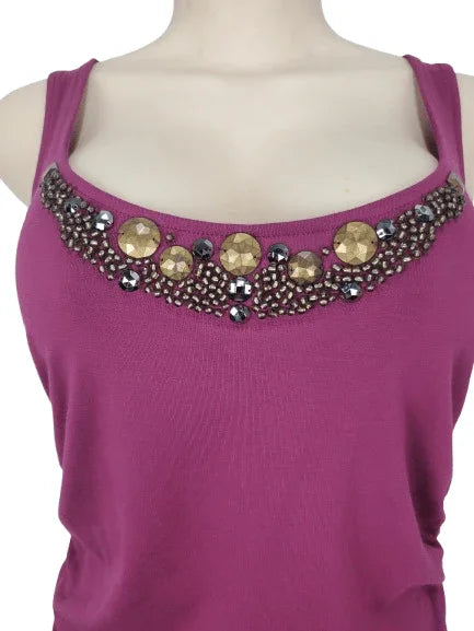 Purple tank top with embellished neckline on a mannequin against a white background