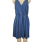 Blue dress on a mannequin against a white background