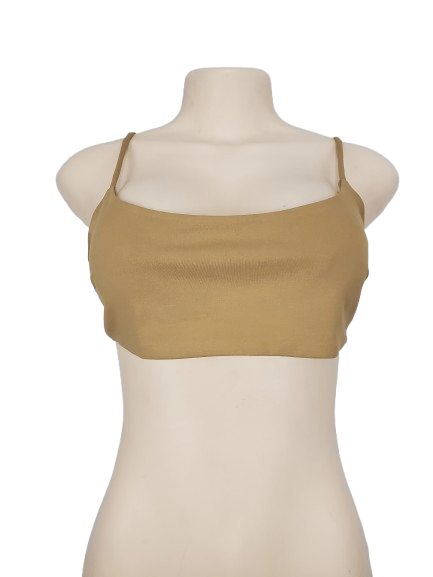 Beige tank top on a mannequin against a white background