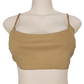 Beige crop top on a mannequin against a white background