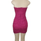 Pink strapless dress on a mannequin against a white background