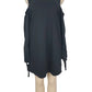Black sleeveless dress on a mannequin against a white background