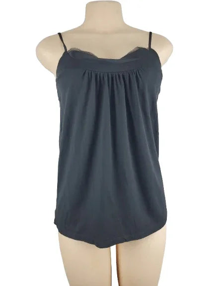 black tank top on a mannequin against a white background