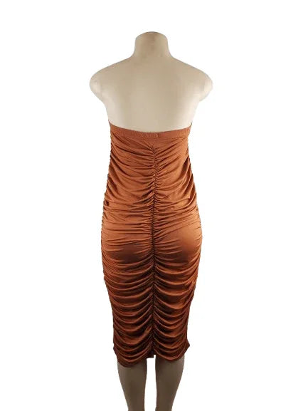Brown strapless dress on a mannequin against a white background