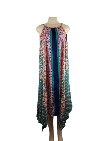 Colorful patterned dress on a mannequin against a white background