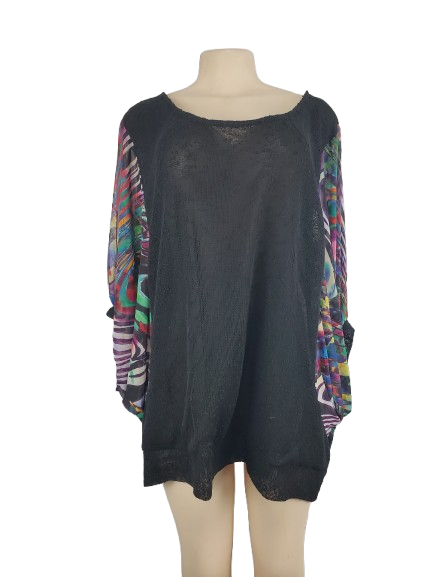 Black oversized shirt with colorful sleeves on a mannequin against a white background