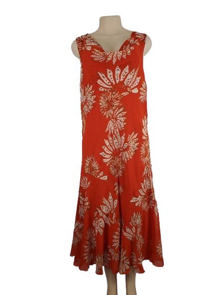 orange dress with white floral pattern on a mannequin against a white background