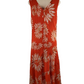 orange dress with white floral pattern on a mannequin against a white backgroundbackground