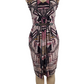 Patterned dress on a mannequin against a white background