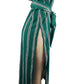 Green and white striped dress on a mannequin against a white background