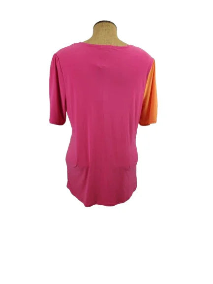 Mannequin wearing a pink and orange top on a white background