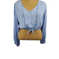 Blue blouse on a mannequin with a white background