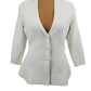 White blouse on a mannequin against a white background
