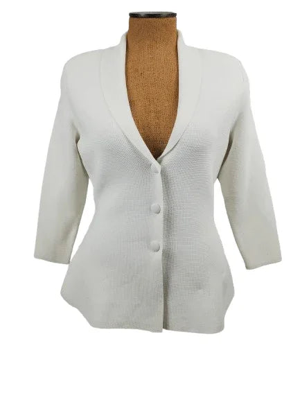 White blouse on a mannequin against a white background