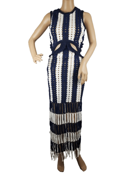 Mannequin wearing a navy and white striped dress with cut-out design on a white background