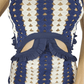 Blue and white striped crochet dress with a bow detail on a mannequin.