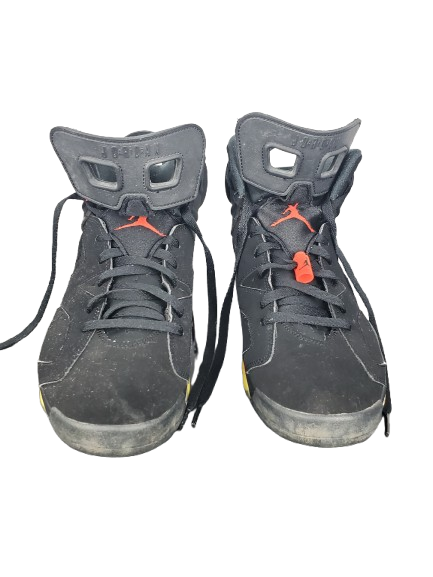 Pair of black high-top sneakers with gray accents on a white background