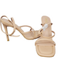Beige high-heeled sandals with thin straps on a white background