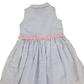 Blue and white striped dress with a pink belt on a white background