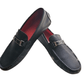 Black loafers with gold buckles on a white background