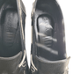 navy leather shoes with floral patterns on a white background