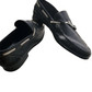 Pair of navy leather loafers on a white background