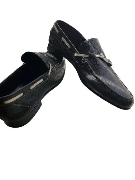 Pair of navy leather loafers on a white background
