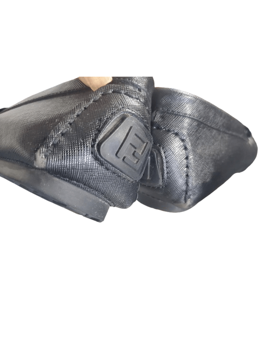 Black glove with a brand logo on a white background