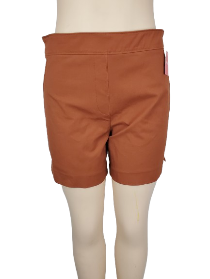 Brown shorts on a mannequin with a white background