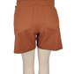 Brown shorts on a mannequin with a white background