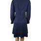 Navy blue dress on a mannequin against a white background