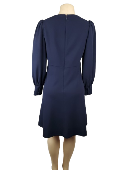 Navy blue dress on a mannequin against a white background