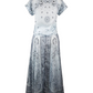 Long skirt and top with a pattern on a white background