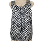 Black and white patterned sleeveless top on a mannequin against a white background