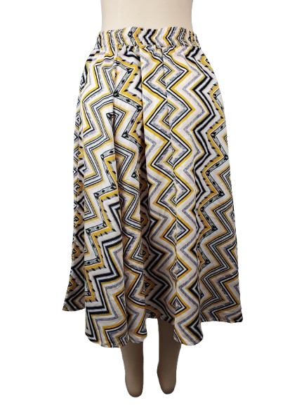 Patterned skirt on a mannequin against a white background