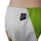 Color-blocked shorts with a brand tag on a white background
