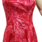 Red dress with pink floral pattern on a white background