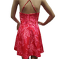 Red dress with white floral pattern on a white background