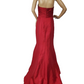 Red strapless evening gown on a mannequin against a white background