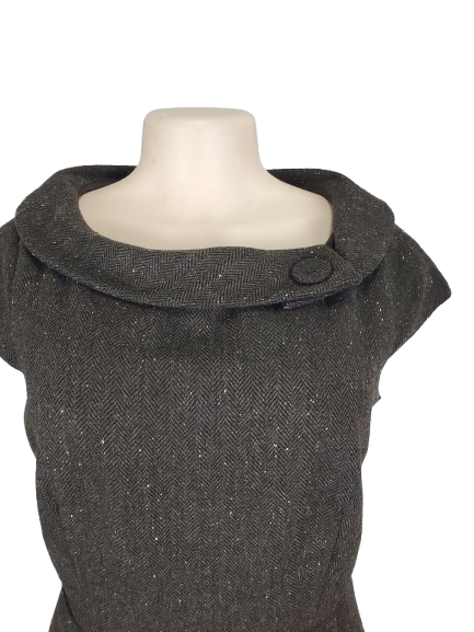 brown textured dress on a mannequin with a white background