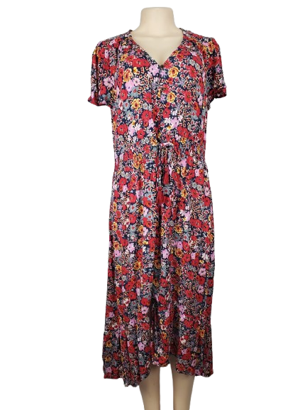 Floral dress on a mannequin against a white background