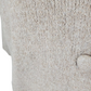 Close-up of a textured stone surface with a slight gradient.
