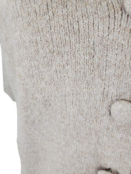 Close-up of a textured stone surface with a slight gradient.